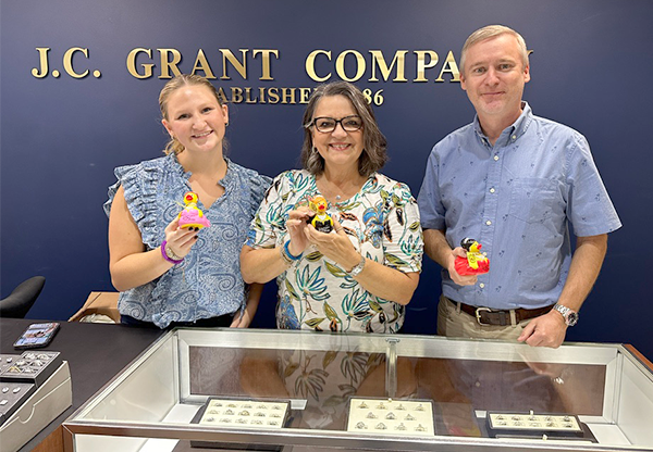 JC Grant Team Holding Rubber Ducks - Rubber Duck Hunt JC Grant Team Holding Rubber Ducks